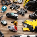 Set,Of,Accessories,For,Cycling,On,Wooden,Background