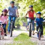 Family,On,Cycle,Ride,In,Countryside